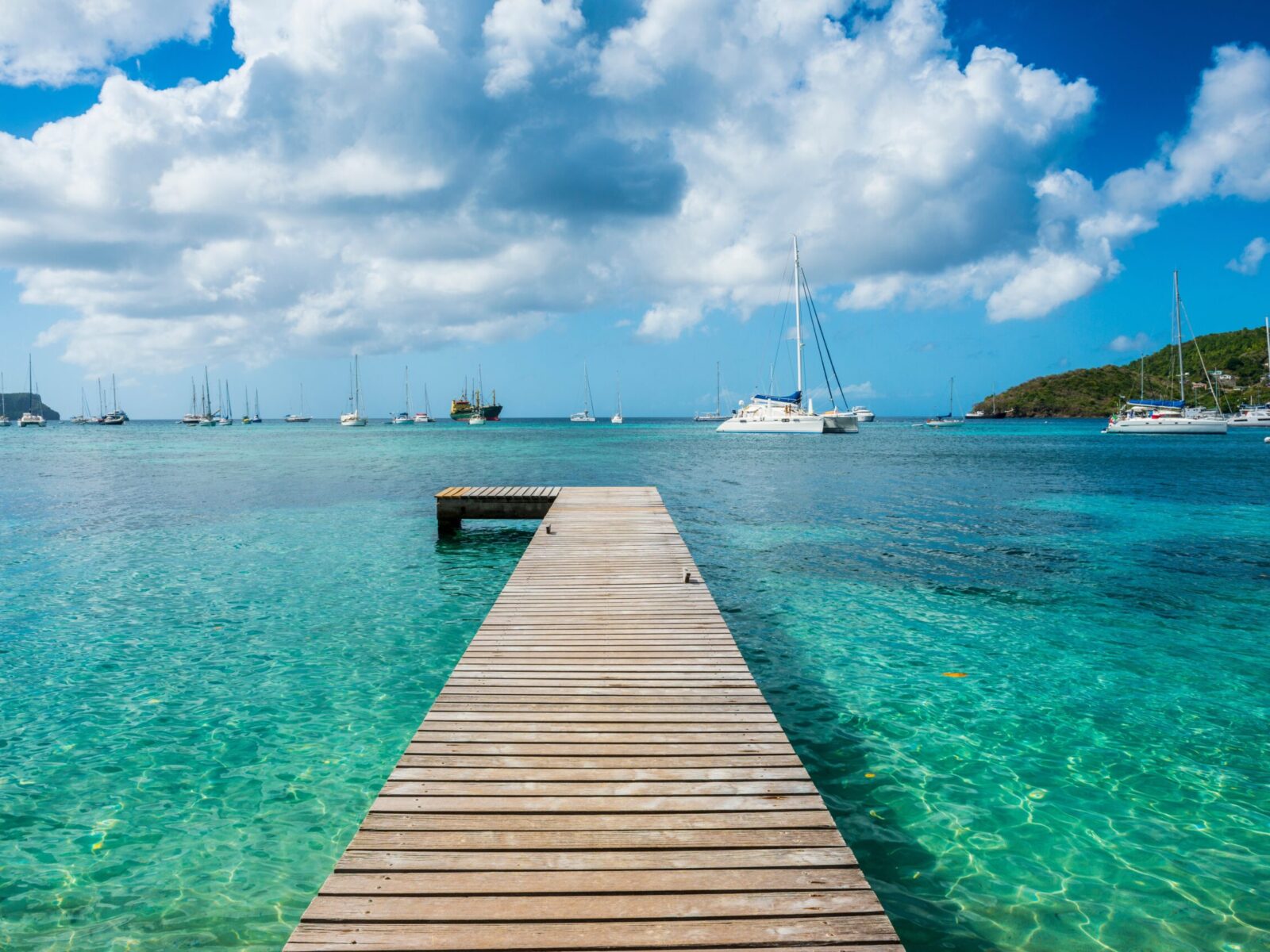 Boat,Pier,In,The,Turquoise,Waters,Of,Admiralty,Bay,,Bequia,