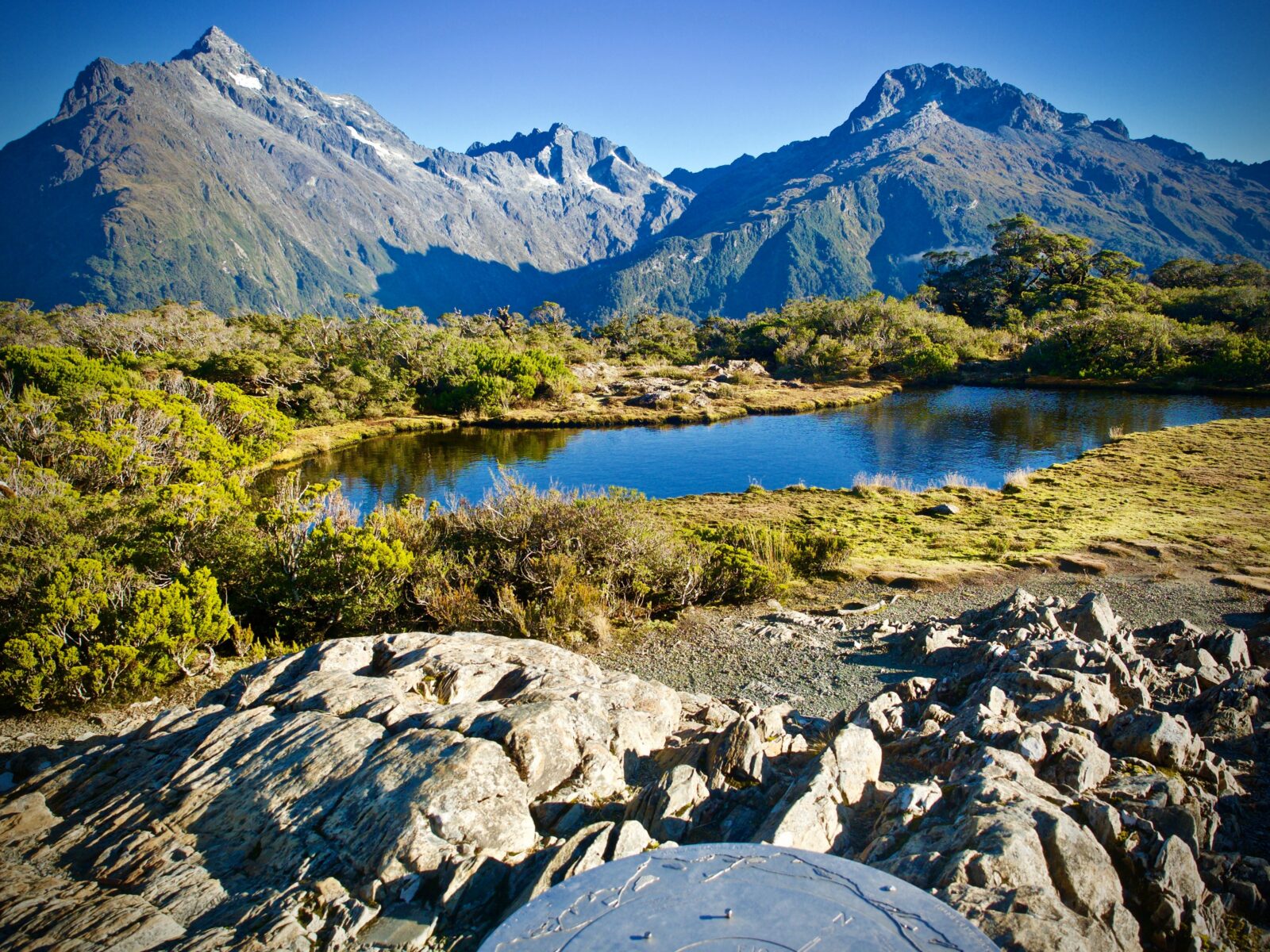 Scenic,View,Of,A,Mountain,Landscape,With,A,Serene,Lake