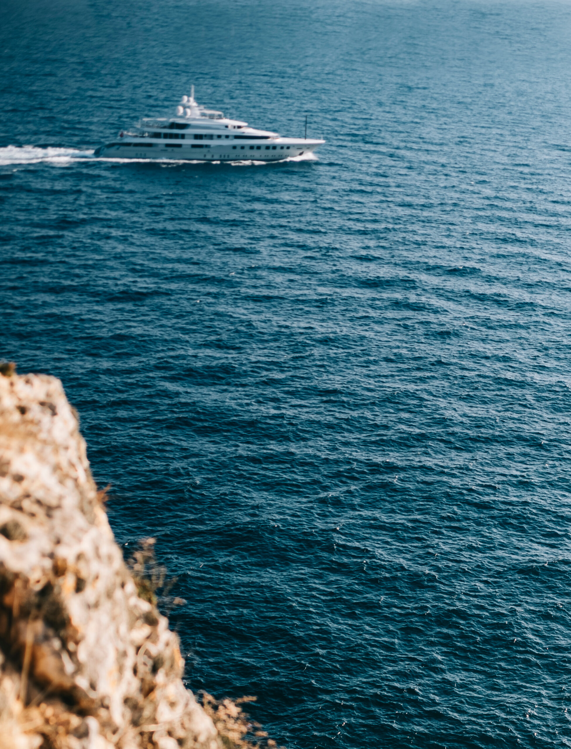 View,From,A,Cliff,Of,A,Yacht,Crossing,The,Sea.